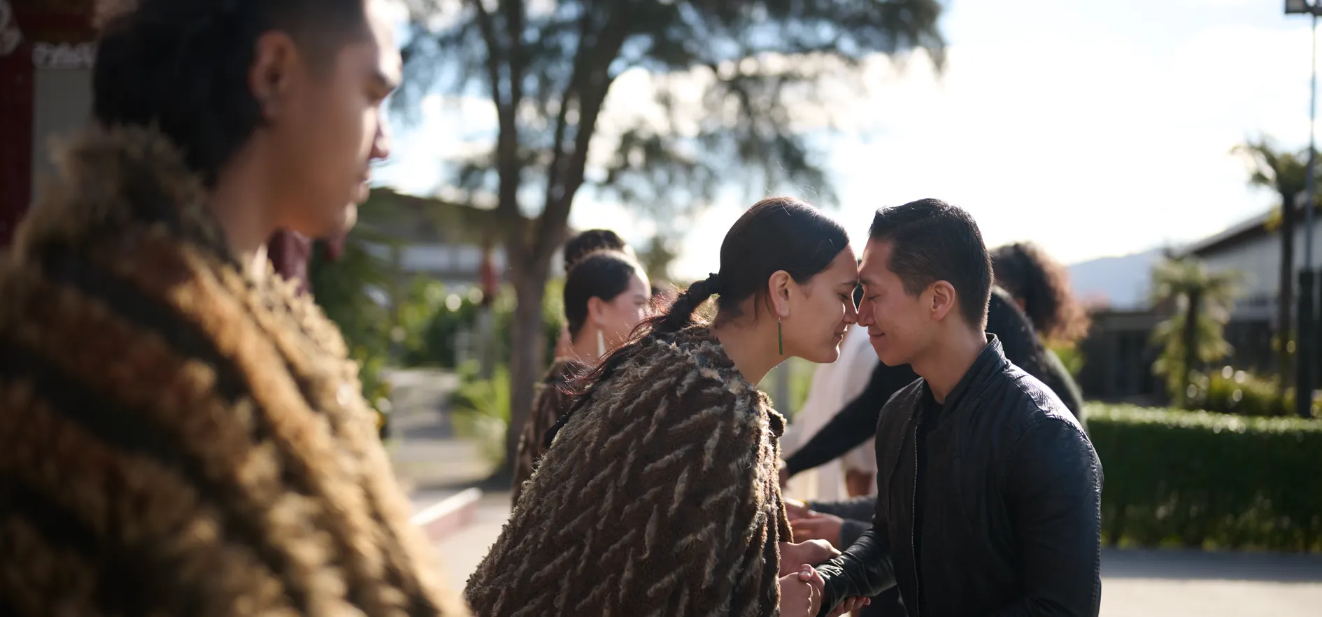 A hongi, the traditional Māori greeting, shared during a welcome at a marae